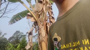 A young man's journey to the rice field where he is urinating again