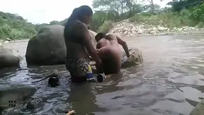 Amateur couple enjoys horny public sex by the river