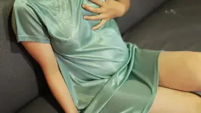 Indonesian stepmom enjoys casual couch session in see-through satin dress