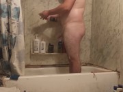 Fat guy jerks dick in shower and swallows own cum