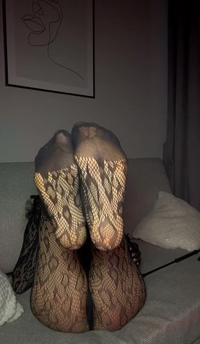 Female Onlyfans Model in Fishnet Stockings