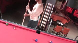 Muscular gay stud Chuck is playing pool and masturbating