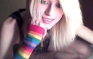Platinum blonde emo tgirl does a bit of softcore posing