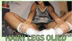 Hairy legs and arms oiled