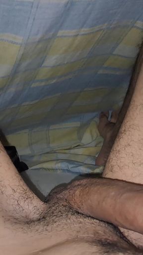 Stroking My Thick Uncut Cock Under the Sheets