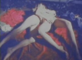 Blue-tinted Vintage Loop Shows Retro Couple in Raw 70s Action