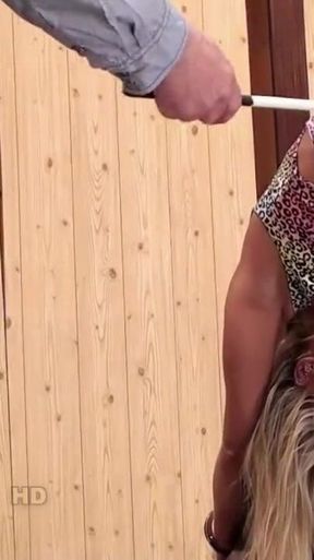 Miela, blonde sexy babe in heels takes whip session with her hands handcuffed