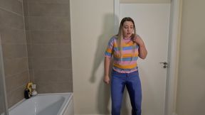 Trapped in a toilet stall, desperate to pee in tight jeans