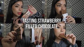 tasting strawberry filled chocolate