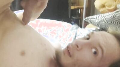 Watch me finger myself while folding over my juicy uncut cock