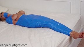 The Luscious Breasts Of Frankie Dee Spill Over The Blue Tape The Wraps Her Sleek Body!