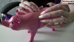 Am I finally going to make a hole in this toy rubber pig?