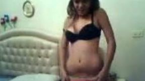 That skinny young bitch stripteases and dances on webcam
