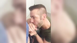 Hunk with a hairy muff gives a steamy bathroom stall blowjob