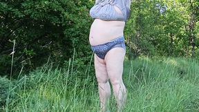 friend undressed in park &mdash;  public pee scene