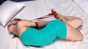 Ballgagged barefoot Sharon in blue dress, hogtied with her legs crossed and with her elbows tightly tied together, is tickled and teased by the man (HD MP4)