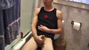 Dan Doe and Jayden have a little bet. Dan claims he can stand on the bathroom counter and shoot his load over onto the shower doors, 5 feet away. $10 is on the table and then $20. Jayden sits on the toilet and plays with himself.