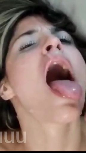 Double Cumshot with Facial and Swallowing a Lot of Milk From Two Big Cocks