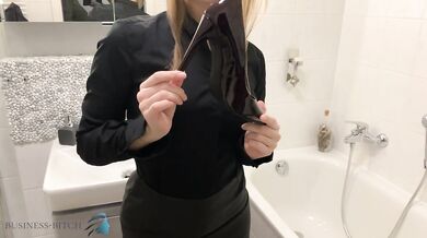 business woman after work undresses for sexy shower