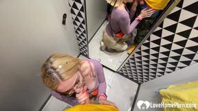 Gf gives a blowjob in the changing booth