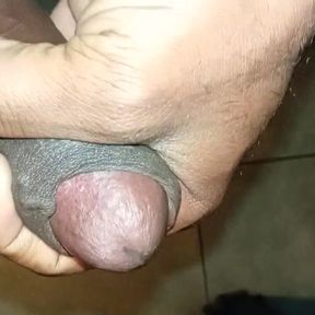 Relaxing with Hand in the Bathroom