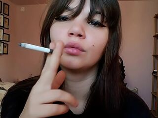 Brunette hair with natural large lips smokin' out of lip makeup