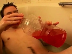 Piss loving young man playing with his cock in a bubble bath