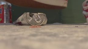 Can crushing with pink van sneakers