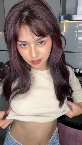 Teeny bopper flaunts her assets