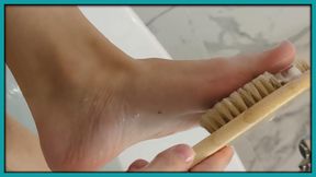 Washing my feet in the bathtub