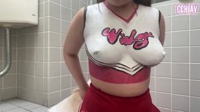 A Curvy Beauty Painted in Color Strolls Boldly Through the City in Playful Tease - D