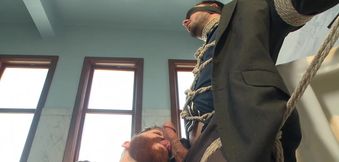 Bound baddie gets his cock jerked in a fun way
