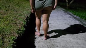 Walking with her tail bared