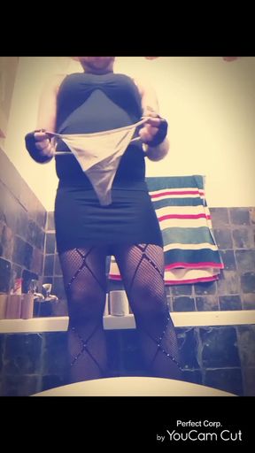 Crossdresser pees in thong while showing off curves