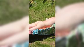 Amateur MILF wife caught sunbathing and stroking