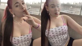 Smoking in a slutty outfit, Mini shorts and a crop top, Visible smoke - Smokingrapunzel
