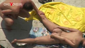 risky voyeur footage of girl gets licked in waves then pounded under the sun