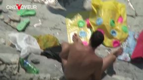 risky voyeur footage of girl gets licked in waves then pounded under the sun