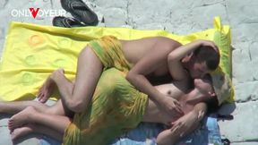 risky voyeur footage of girl gets licked in waves then pounded under the sun