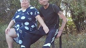 a friend in a public park jerks off my dick on a bench