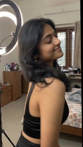 Indian woman in black tank top