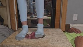 Chrissy stomping on Dans face in a facebox