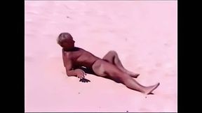Beach Striptease: Tanned Hunk Bares All