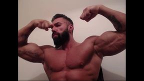 Bodybuilder Flexes His Veiny Arms