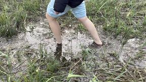 muddy feet in a swampy bog