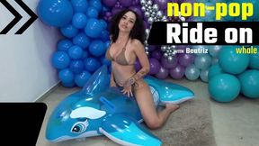 Beatriz Enjoys a Fun Ride on Her Blue Intex Whale