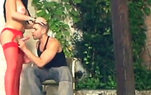 Tranny in red stockings doggystyled