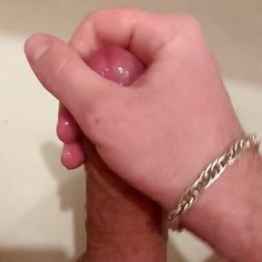 18 year old young guy masturbates his big cock at a party