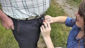 In public. Public Exhibitionist. MILF beautiful Frina outside holds peeing mans cock in her hands. Pissing dick. Urine. Piss. Outdoors. Outdoor. Golden rain.