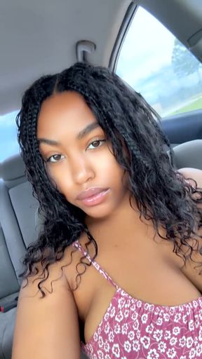 Black woman in car